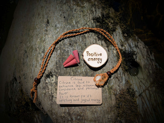 An ethically sourced gift set, containing a Citrine crystal necklace, incense and a handmade pyrography/ woodburning artwork