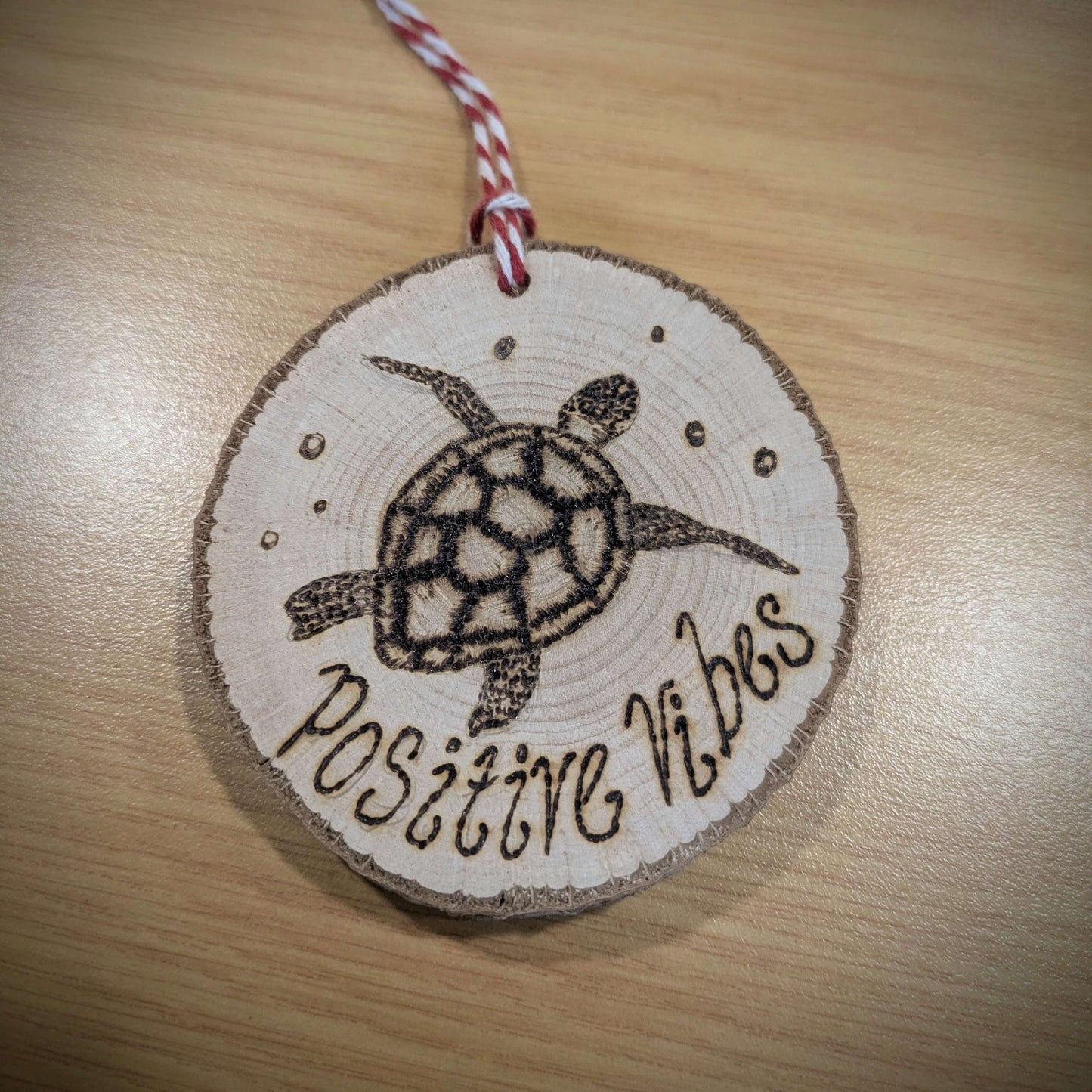 Bespoke turtle woodburning on Welsh Hazel